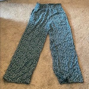 floral green pants with blue and white flowers